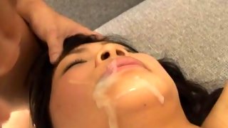 Japanese whore has her mouth filled with dicks