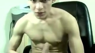 Yummy twink masturbates in front of a camera.