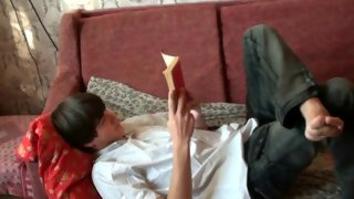 Dark haired bloke reads book before sex