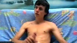 Inviting twink plays with his huge pecker.