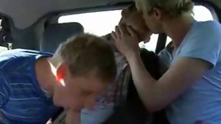 Kinky gay boy sucks a fat cock in a car.
